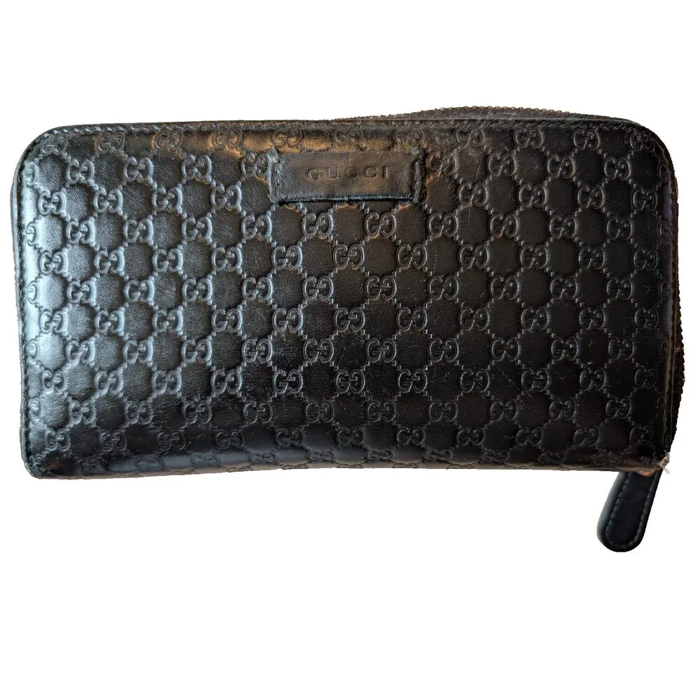 GUCCI Round Zip Micro Guccissima Wallet